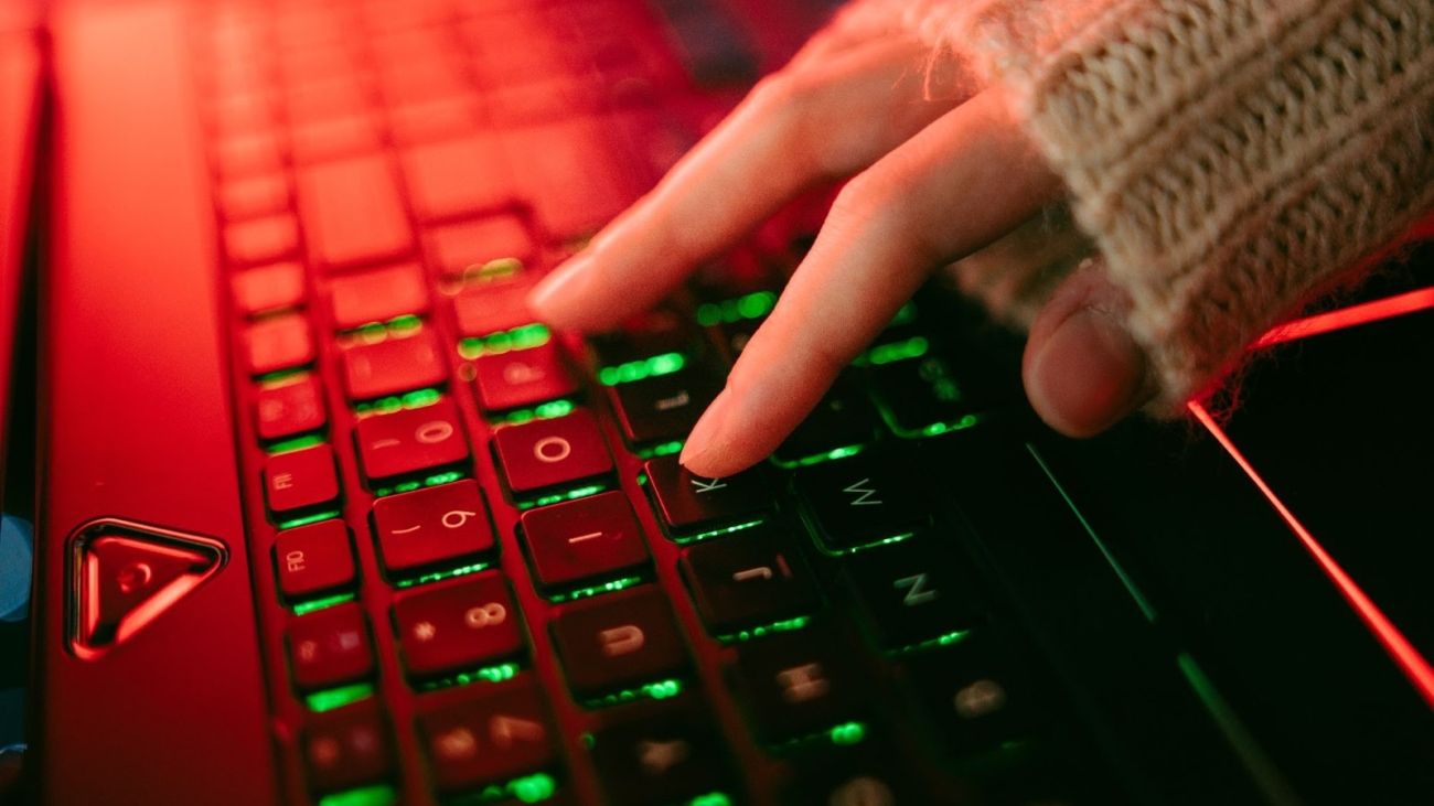 close-up of fingers on a gaming keyboard