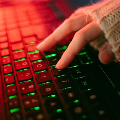close-up of fingers on a gaming keyboard